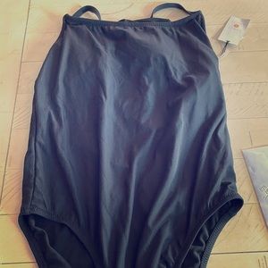 Ribbed black one piece bathing suit.